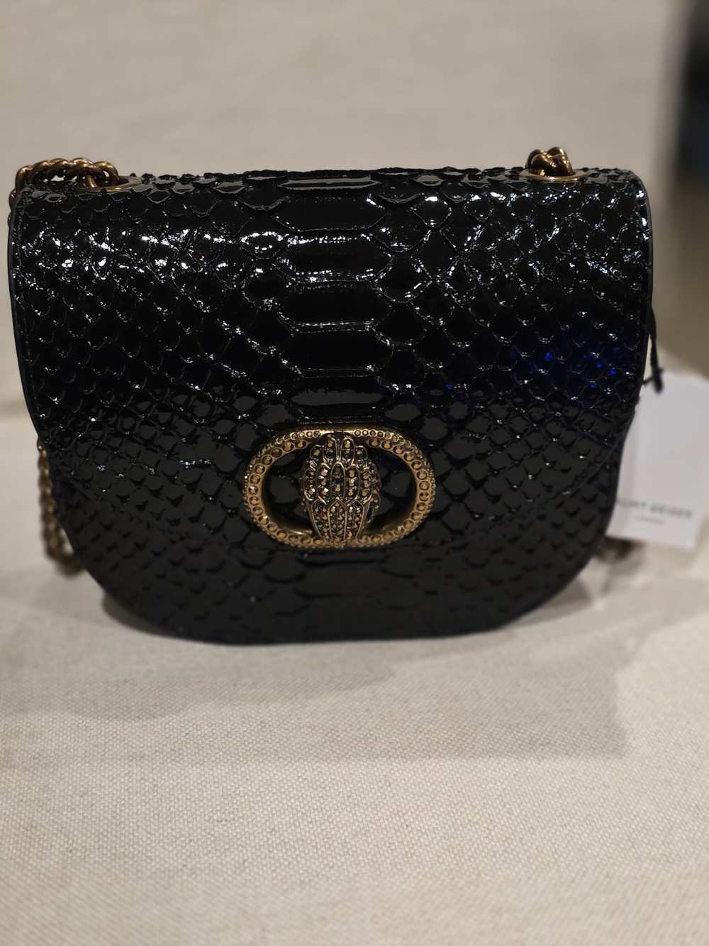 Kurt Geiger Black Patent Snake-Embossed Crossbody Bag with Gold Accent